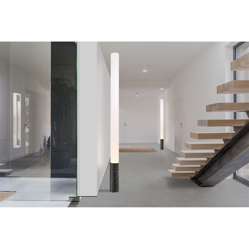 The Elise Floor from Pablo Designs next to a staircase and down the hallway.