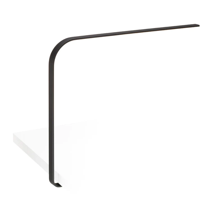The LIM C under-surface table light from Pablo Designs in graphite.