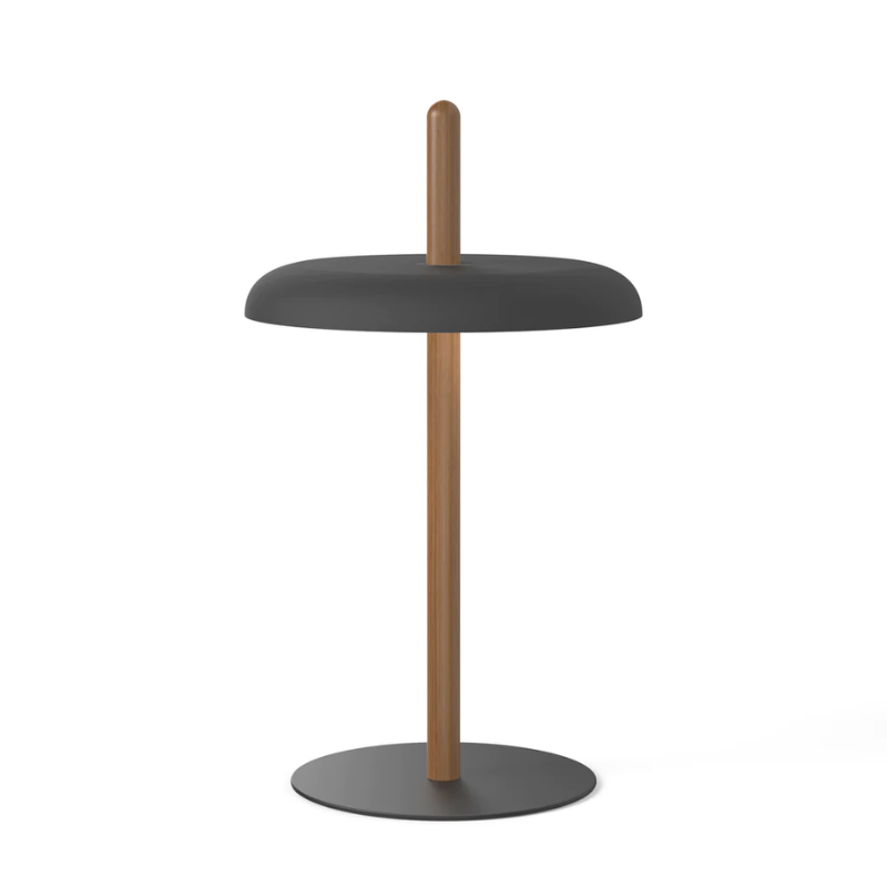 The Nivél Table from Pablo Designs with an walnut post and black shade.