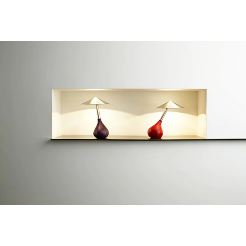 The purple and red Piccola on a shelf in a lifestyle shot.