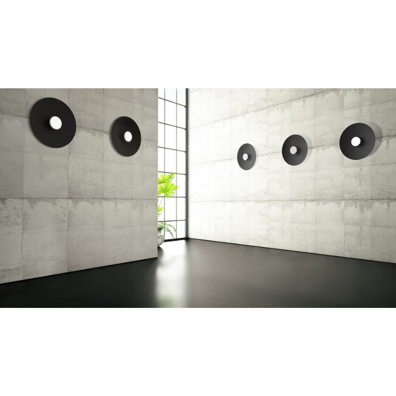 The Sky Dome Flush Metal from Pablo Designs mounted into the wall in a high ceiling family space.