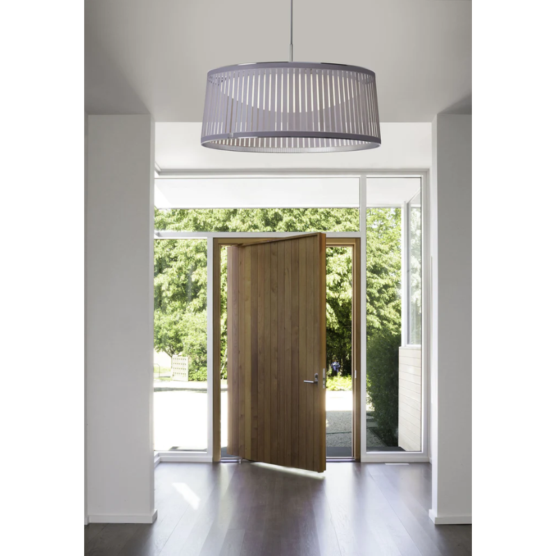 The Solis Drum from Pablo Designs above an entryway.