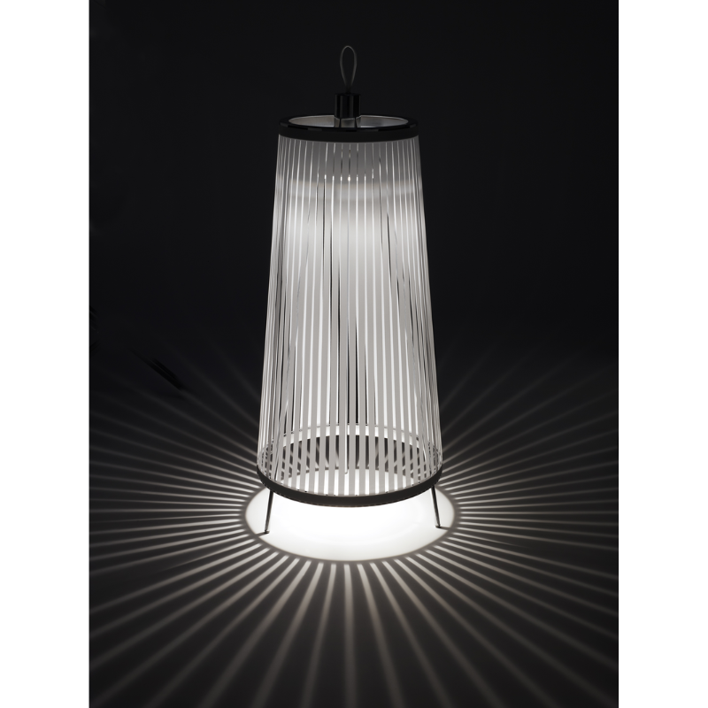 The Solis Pendant from Pablo Designs in a dark room showing how the fabric creates a fragmented lighting result.