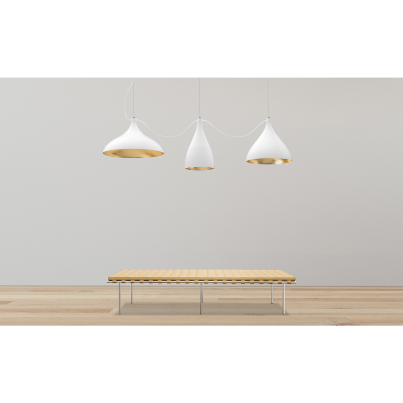 The Swell XL String 3 Mixed from Pablo Designs suspended above a bench in a lounge area.