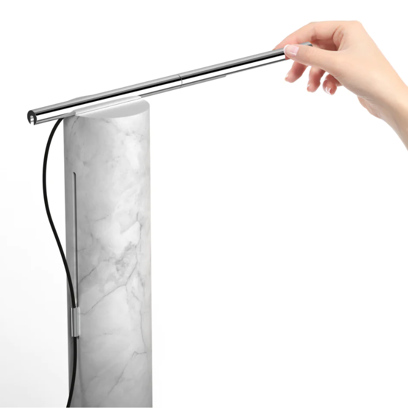 The T.O Table from Pablo Designs being rotated (up to 360 degrees).