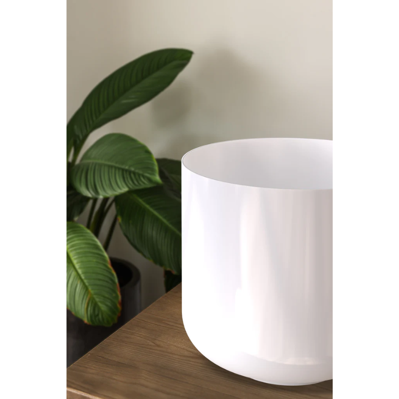 The Totem Table Single from Pablo Designs on a counter top in a lifestyle photograph.