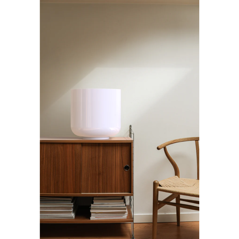 The Totem Table Single from Pablo Designs in a living room.