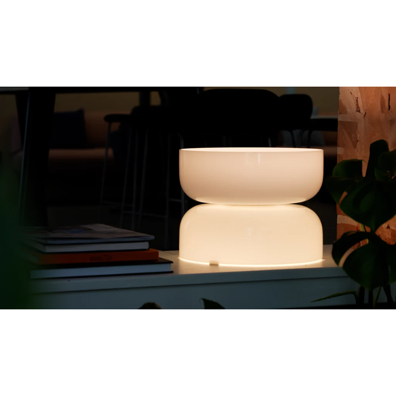 The Totem Table from Pablo Designs in a lounge area.