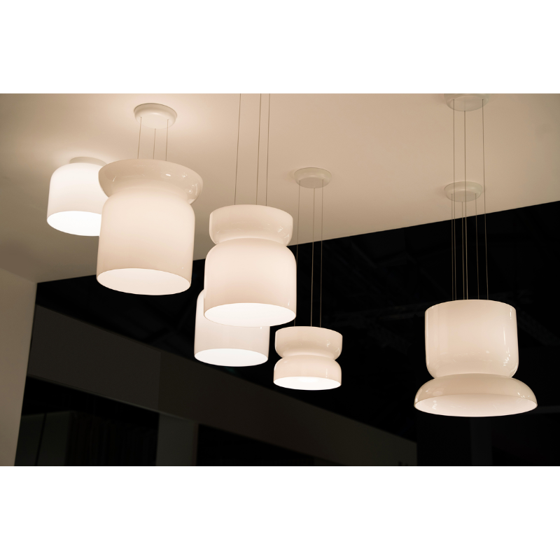 The Totem Up/Down Light from Pablo Designs in a display.