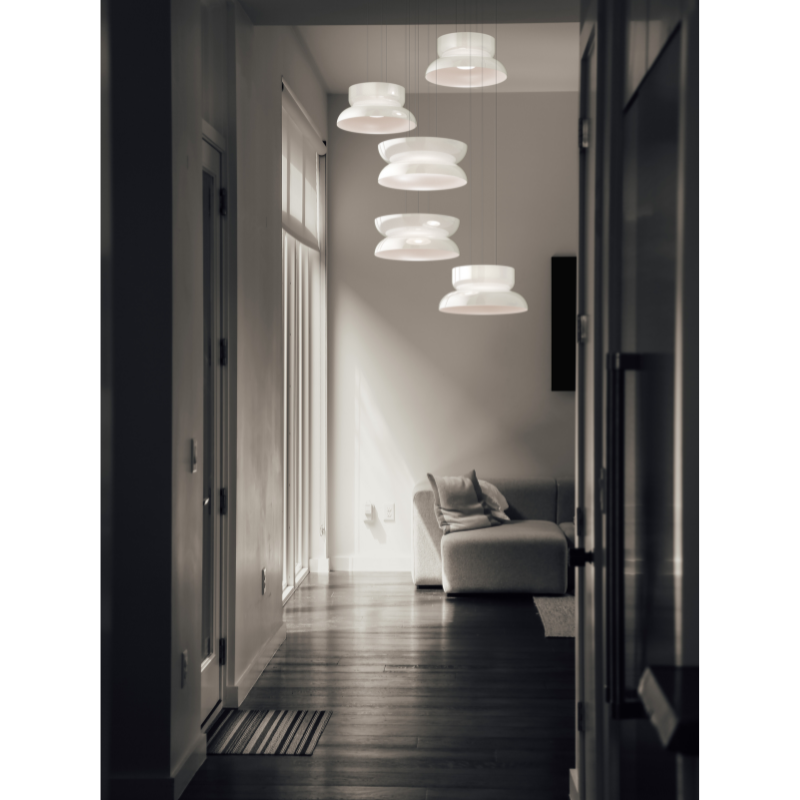 The Totem Up/Down Light from Pablo Designs in a living room.