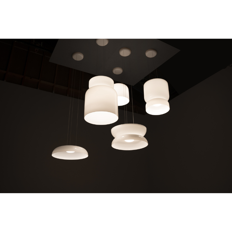 The Totem Up/Down Light from Pablo Designs in multiple styles next to one another.