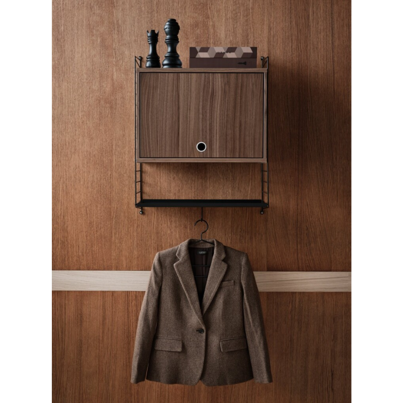 The Cabinet with Flip Door from String Furniture in an entryway.