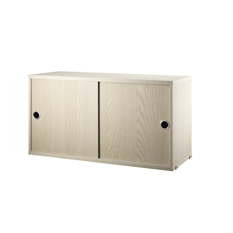 The Cabinet with Sliding Doors from String Furniture in the 11.8 inch depth size and ash color.