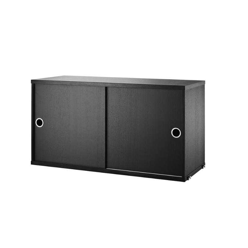The Cabinet with Sliding Doors from String Furniture in the 11.8 inch depth size and black stained ash color.