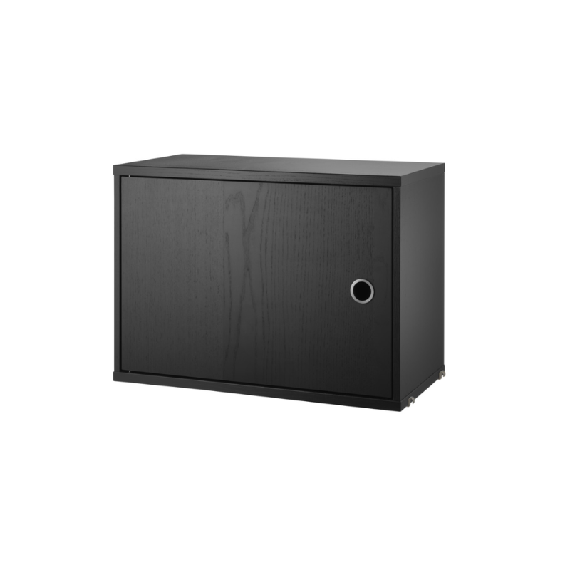 The Cabinet with Swing Door from String Furniture in black stained ash.