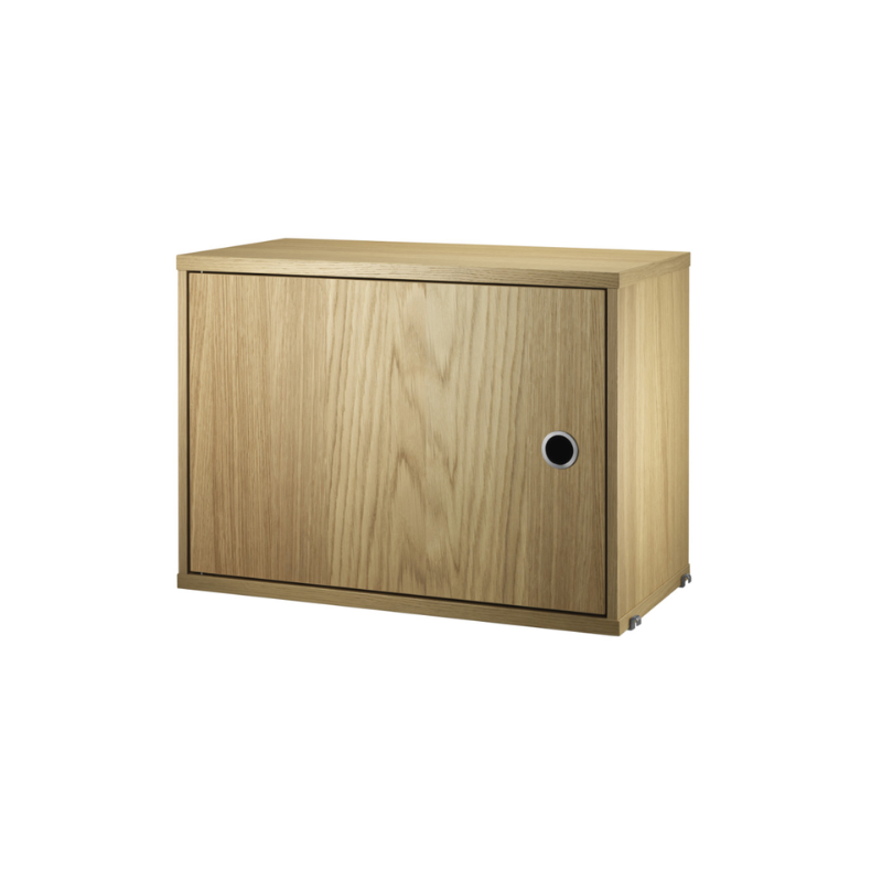 The Cabinet with Swing Door from String Furniture in oak.