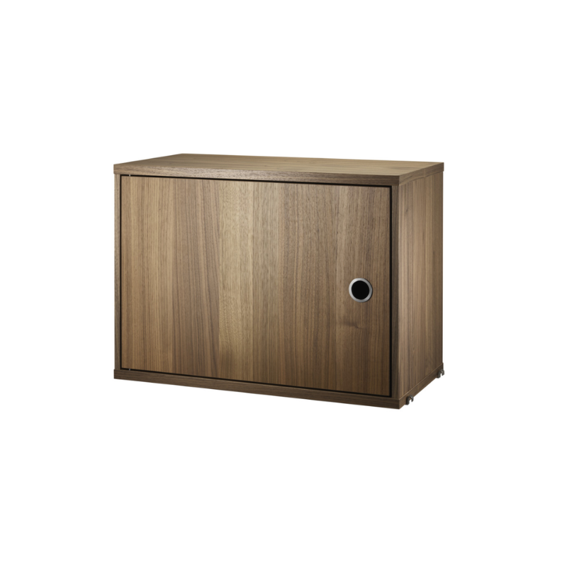 The Cabinet with Swing Door from String Furniture in walnut.