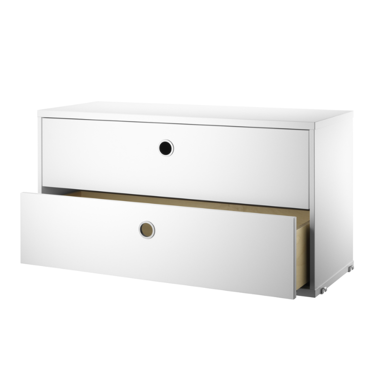 The Chest of Drawers from String Furniture in 30.7 inch width size and white finish, open.