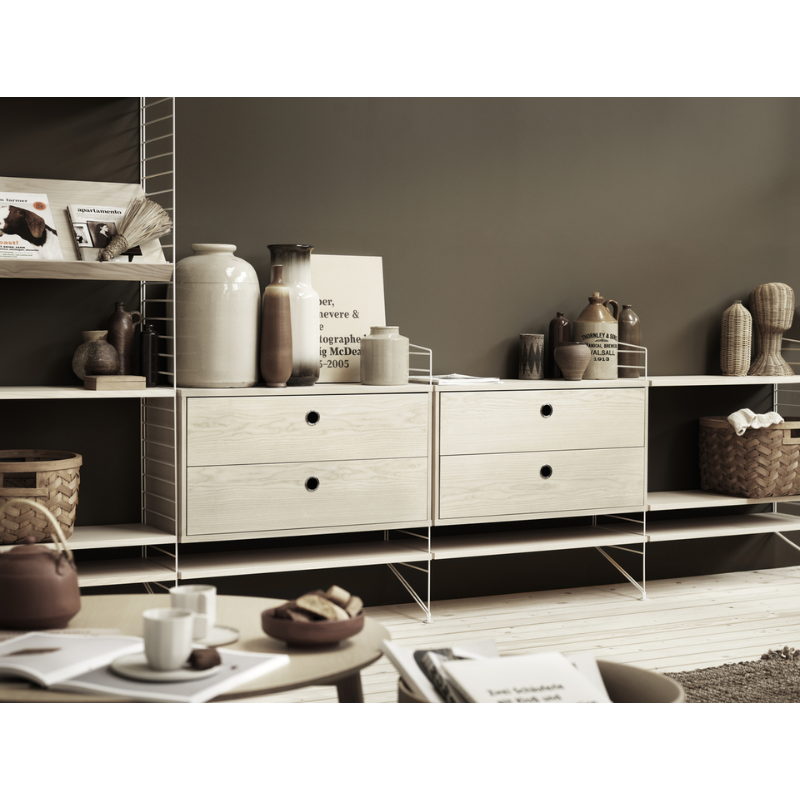 The Chest of Drawers from String Furniture in a studio.