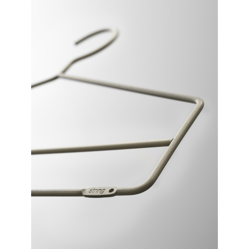 The Coat Hangers from String Furniture in a studio shot.