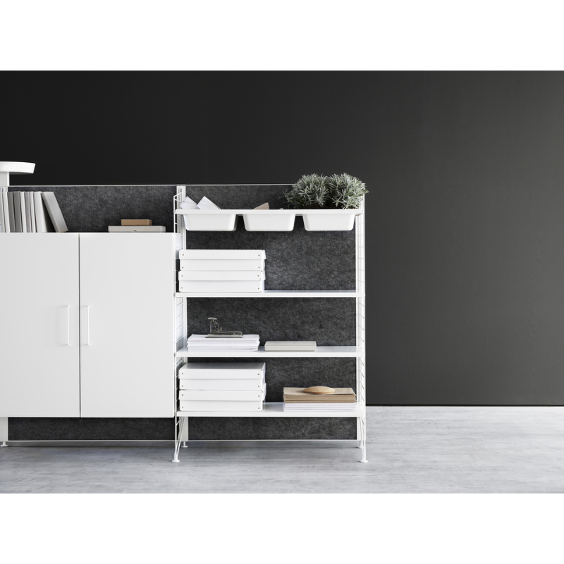 The Floor Panels from String Furniture in white in a residential setting.