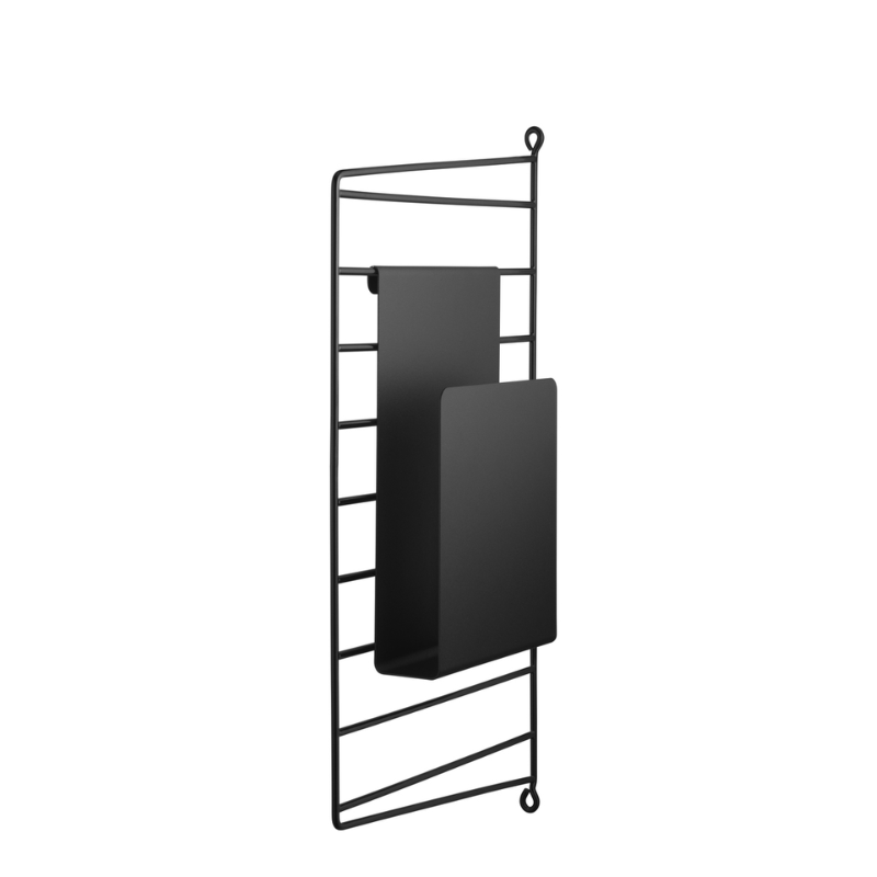 The Magazine Holder from String Furniture in black. Note, the rack is note included.
