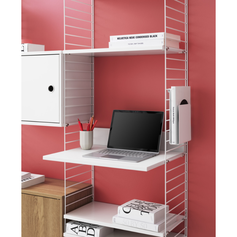 The Media Shelf from String Furniture in a home office.