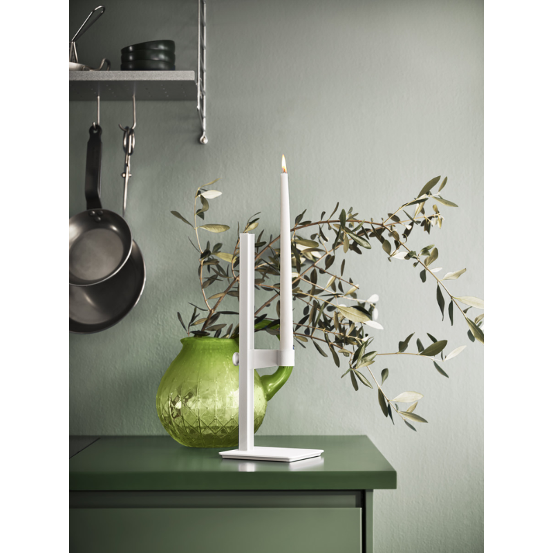 The Museum Candle Holder from String Furniture in a kitchen and dining space.