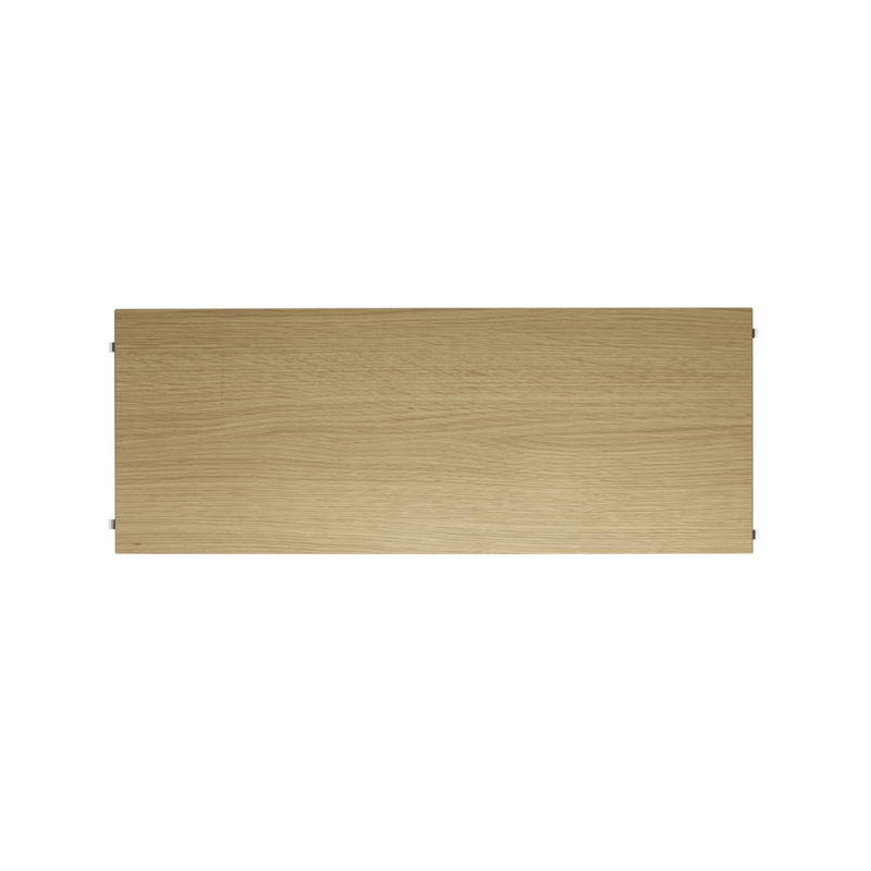 The Shelves from String Furniture in 30 x 11.8 inch size and oak color.