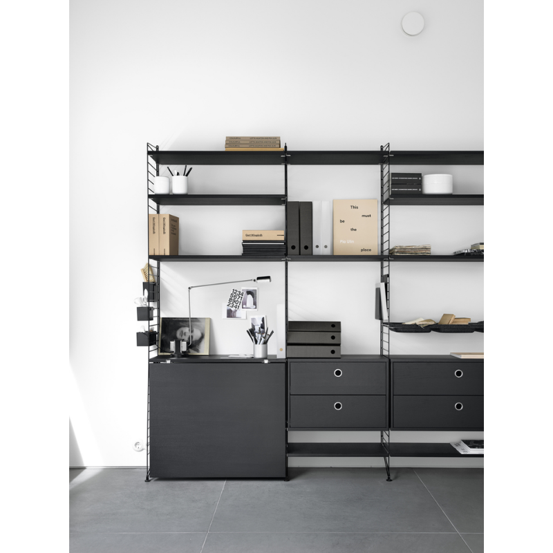 The Shelves from String Furniture in a lounge.