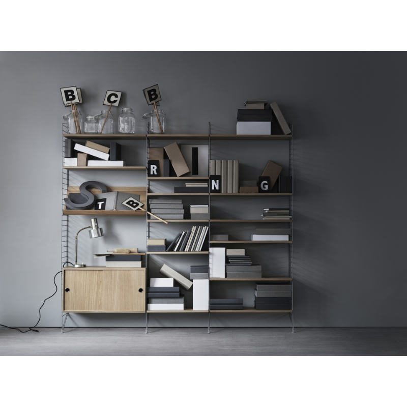 The Shelves from String Furniture in an office.