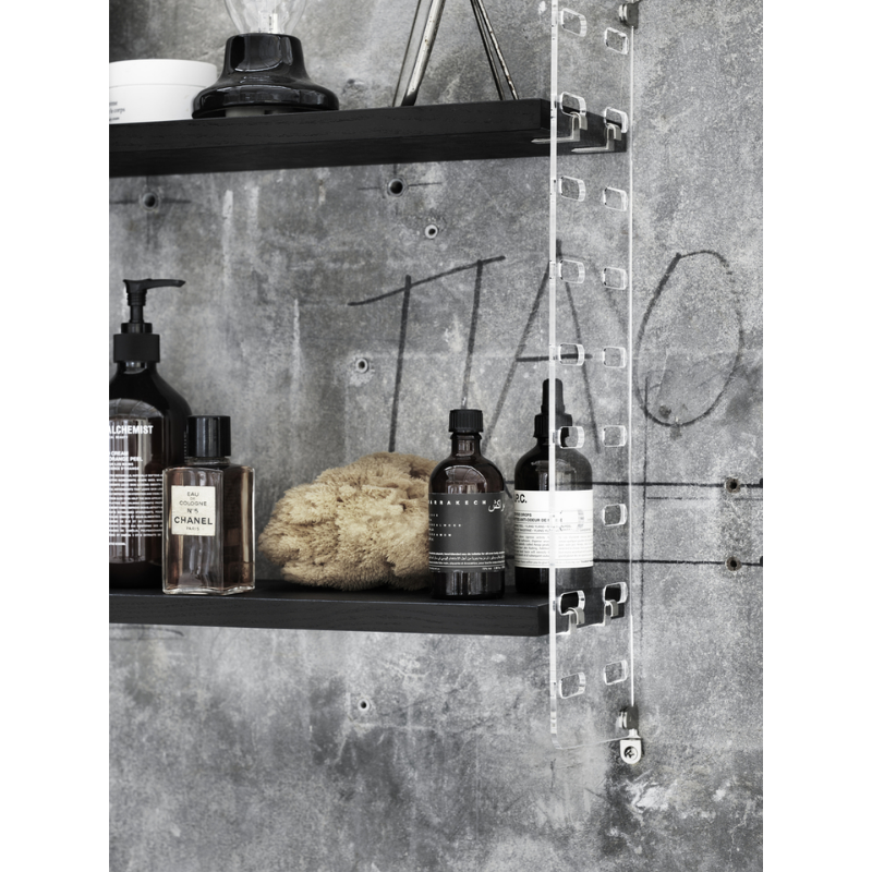 The Shelves from String Furniture in a restroom.