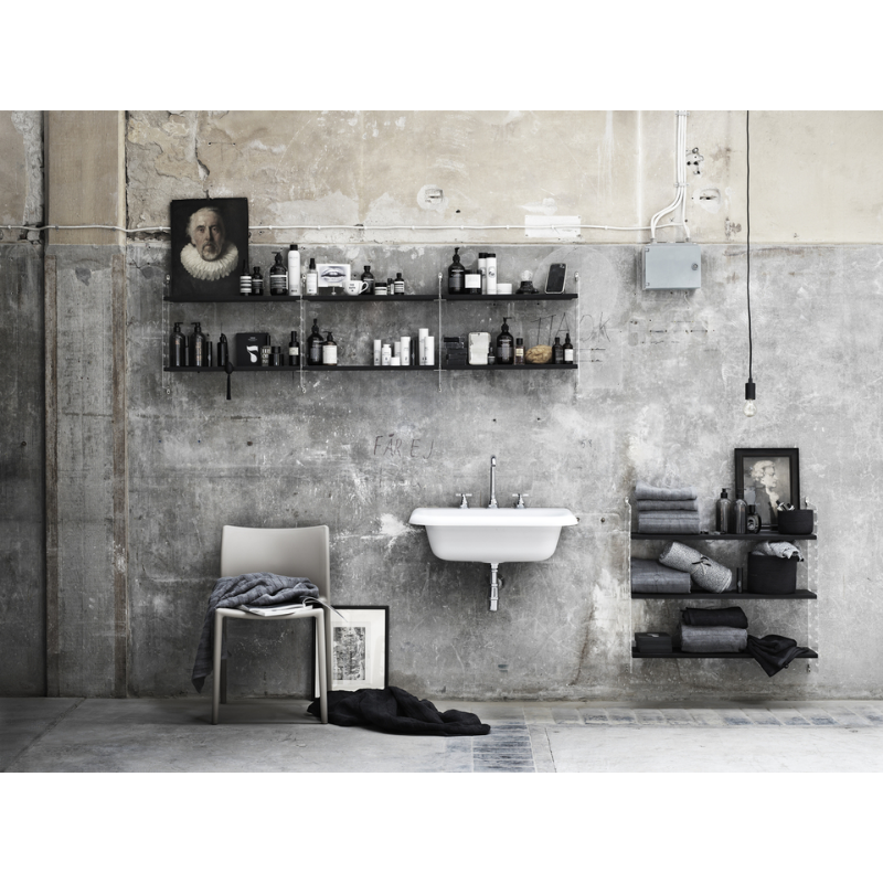 The Shelves from String Furniture used for storage.