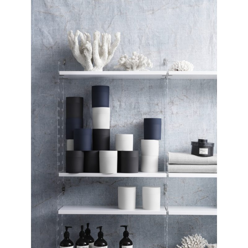 The Shelves from String Furniture being used for toiletries.