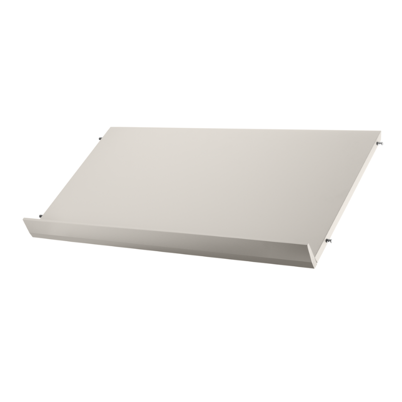 The 30.7 inch Solid Magazine Shelves from String Furniture in beige.