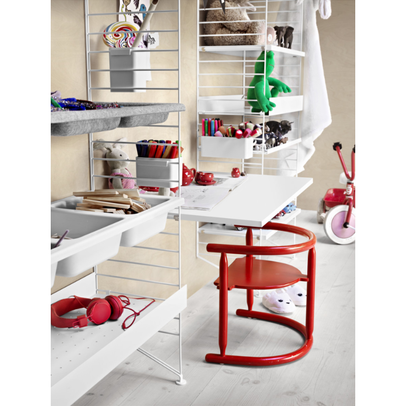 The Work Desk from String Furniture in a kids room.