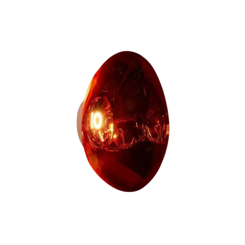 Tom Dixon's Melt LED Surface Wall Sconce is a beautifully distorted pendant in collection of modern finishes with matching ceiling rose. Featuring an integrated LED module, this ceiling light creates a mesmerizing melting hot-blown glass effect when turned on, and a mirror-finish effect when off. This piece is made in Germany using a high tech manufacturing techniques to achieve the perfect melted orb for your design.