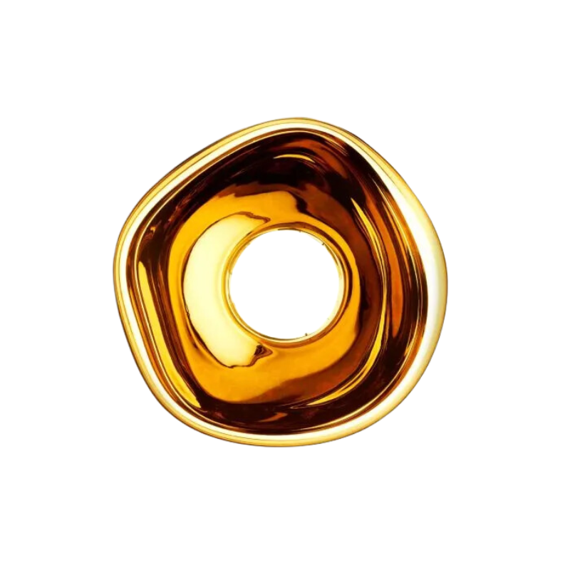 Tom Dixon's Melt LED Surface Wall Sconce is a beautifully distorted pendant in collection of modern finishes with matching ceiling rose. Featuring an integrated LED module, this ceiling light creates a mesmerizing melting hot-blown glass effect when turned on, and a mirror-finish effect when off. This piece is made in Germany using a high tech manufacturing techniques to achieve the perfect melted orb for your design.