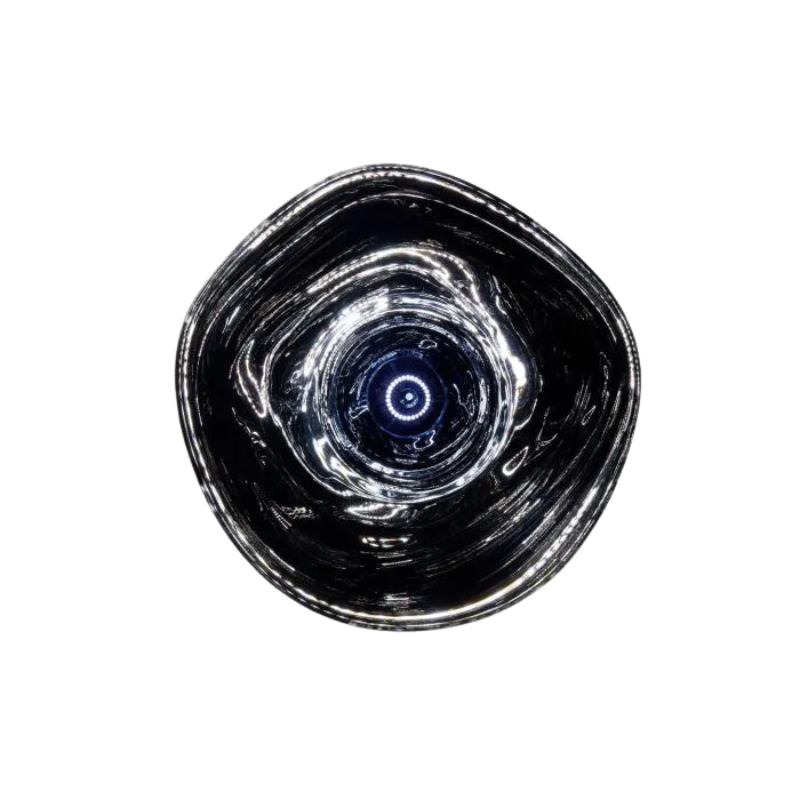 Tom Dixon's Melt LED Surface Wall Sconce is a beautifully distorted pendant in collection of modern finishes with matching ceiling rose. Featuring an integrated LED module, this ceiling light creates a mesmerizing melting hot-blown glass effect when turned on, and a mirror-finish effect when off. This piece is made in Germany using a high tech manufacturing techniques to achieve the perfect melted orb for your design.