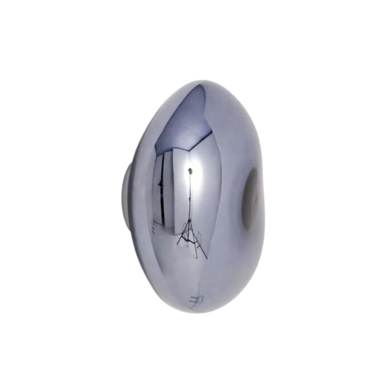 Tom Dixon's Melt LED Surface Wall Sconce is a beautifully distorted pendant in collection of modern finishes with matching ceiling rose. Featuring an integrated LED module, this ceiling light creates a mesmerizing melting hot-blown glass effect when turned on, and a mirror-finish effect when off. This piece is made in Germany using a high tech manufacturing techniques to achieve the perfect melted orb for your design.