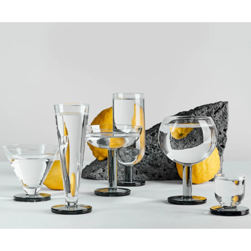 All of the Puck Glasses from Tom Dixon with the Puck Shot Glass on the far right.