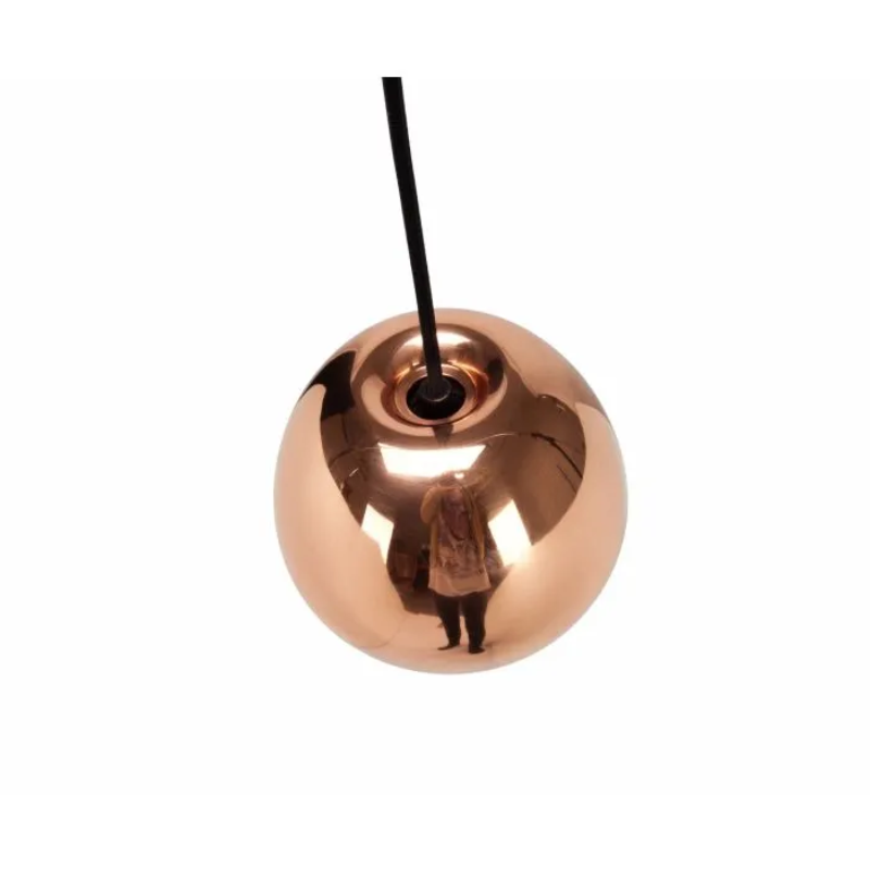 The process of creating Tom Dixon's Void is complex. Cut from a sheet of pure metal, each light is then pressed and spun, and brazed at the end to form a double-walled shade. The high-shine reflectivity achieved with lathing, polishing and caring for the base metals is a bold finish that carries across the Void collection.