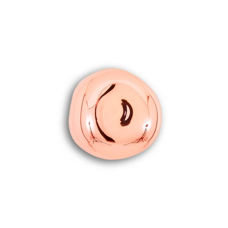 Tom Dixon's Melt is a beautifully distorted pendant in a modern Copper, Gold, Smoke and Chrome finishes and matching ceiling canopies. Featuring our integrated LED module, this ceiling light creates a mesmerizing melting hot-blown glass effect when on and a mirror-finish effect when off. Made in Germany using a high tech manufacturing technique to achieve the perfect melted orb.