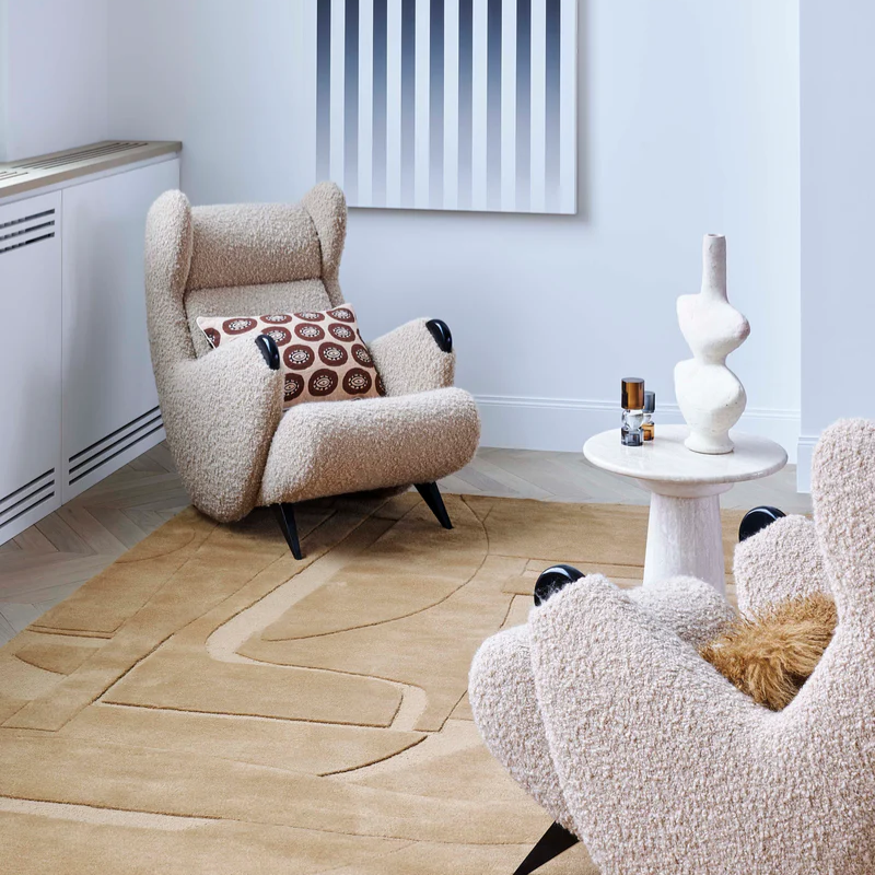 The Collage Wool Rug from Toulemonde Bochart in a den.