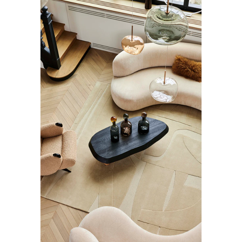 The Collage Wool Rug from Toulemonde Bochart in a lounge.