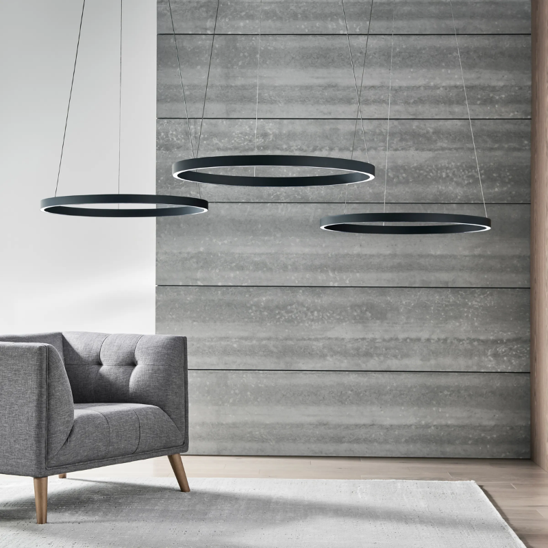 The Fiama Suspension Light from Visual Comfort and Co in a living room.