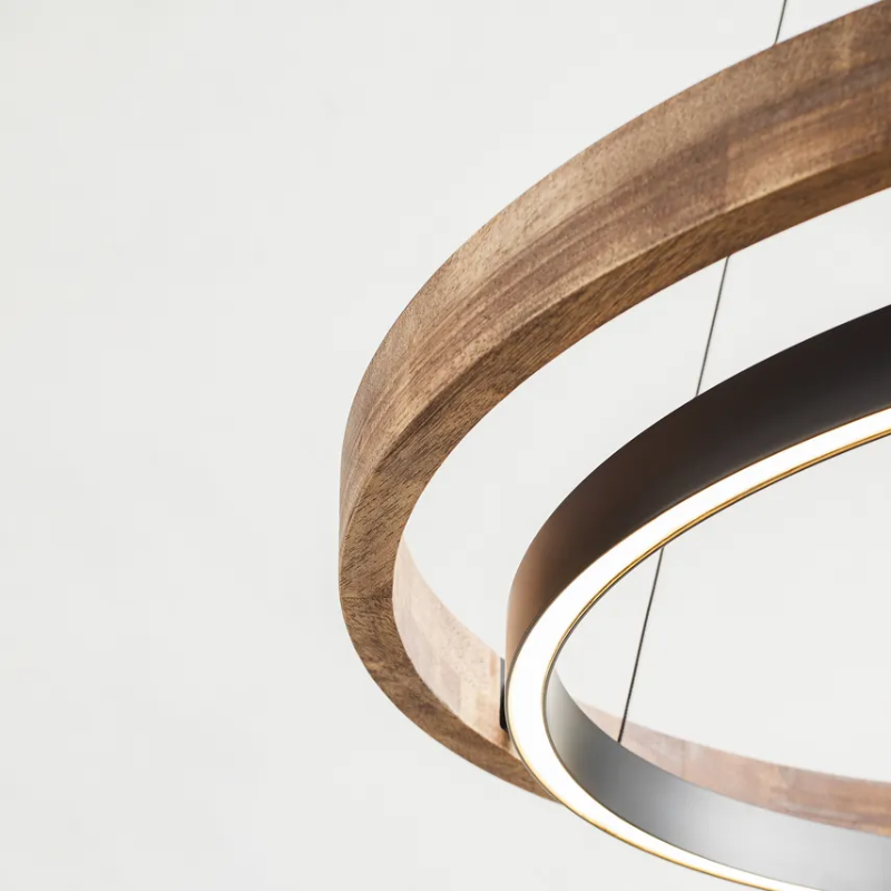 The Grace Chandelier by Sean Lavin is designed with two rings that illuminate this contemporary chandelier. A large outer ring provides organic texture while complemented by a decorative inner ring, housing gently diffused upward and downward LEDs.