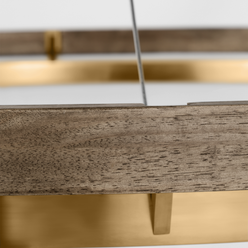 The Grace Chandelier by Sean Lavin is designed with two rings that illuminate this contemporary chandelier. A large outer ring provides organic texture while complemented by a decorative inner ring, housing gently diffused upward and downward LEDs.