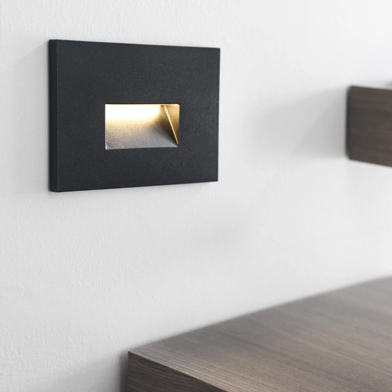 The Ikon Outdoor Step Light from Visual Comfort and Co in a lounge lifestyle photograph.