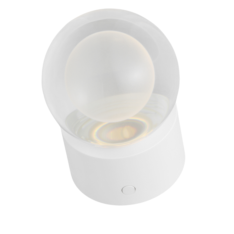 The Mina Accent Rechargeable Table Lamp from Visual Comfort and Co in a studio lifestyle photograph.